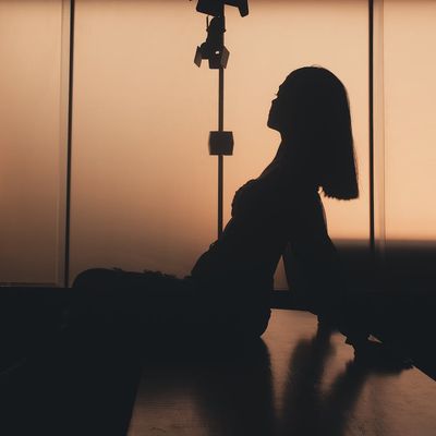 Abstract silhouette of a woman in a balancing pose